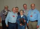 Lee Fish, K5FF, receives the Fred Fish Memorial Award #1 on behalf of her husband Fred Fish, W5FF (SK), at the Texoma Hamorama in Ardmore, Oklahoma on October 25. Front row, left to right: West Gulf Division Director Coy Day, N5OK; Lee Fish, K5FF, and West Gulf Division Vice Director David Woolweaver, K5RAV. Back row, left to right: Richard Allen, W5SXD; Oklahoma Section Manager John Thomason, WB5SYT, and Marshall Williams, K5QE. [Photo courtesy of David Woolweaver, K5RAV]
