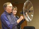 On her two-day visit to ARRL HQ, ARRL Laboratory Engineer Mike Gruber, W1MG, showed Smith how they detect power line noise. [S. Khrystyne Keane, K1SFA, Photo]