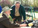 John Swartz, WA9AQN (left) showing one of the Scoutmasters how he makes CW contacts at special event station N9L, located at the Lincolns New Salem State Historic Site.