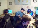 Neil, KC9MLD; Hunter, K8MBI, Derek (unlicensed), and Tyler, KC9FKE (in foreground) running the Michigan QSO Party (Ed Engleman, KG8CX, Photo)