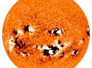 This October 2003 (Solar Cycle 23) photo shows an abundance of sunspot activty during a solar storm. Unfortunately, scientists are predicting a weak Solar Cycle 24 and we probably won't see activity like this for some time. [Photo courtesy of NOAA]