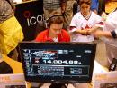 Here I am, deep in concentration at the ICOM booth. [Brian Short, KC0BS, Photo]