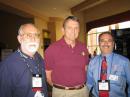 John McHugh, K4AG (left), and Julio Ripoll, WD4R (right), coordinators of the NHC's Amateur Radio Station, WX4NHC, met with NHC Director Bill Read, KB5FYA (center). [Photo courtesy of Julio Ripoll, WD4R]