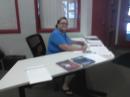 Sylvia at the information and sign in table.