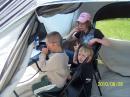 Hailee, KF7CBC, supervises her brother, Cody, and her cousin Ramsy on the 6 meter station Saturday afternoon. Ramsy would make a six meter contact Sunday morning.