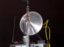 This is my newest and most compact 10-band rover station.  It has no exterior antennas at all and can be quickly installed on the passenger seat of almost any car.  The antennas are aimed out the window.  The entire station is housed in and on a 12 x 17 x 3" chassis.  Five DB6NT transverters (for 1.2 GHz, 2.3 GHz, 3.4 GHz, 5.7 GHz and 10 GHz) are mounted inside the box along with many SMA relays for the necessary bandswitching.  An FT-817 provides 50, 144 and 432 MHz plus the i.f. for the higher bands.  An Alinco DJ-G29 HT provides 222 and 902 MHz.  The system is fully wired for a transverter in lieu of the HT for 902, but that adds to the unit's weight and was never needed during this VHF contest.  The antennas are typical "rubber ducks" on the lower bands, with a WA5VJB log periodic for 902, 1.2, 2.3 and 3.4 GHz.  It also will work well on 5.7 GHz, but the dual-band 5.7 and 10 GHz dish is used for higher gain on those bands.  The system has a Rubidium standard to assure frequency accuracy on the microwave bands.  This is not the place for a full-blown construction article, but this system worked very well on its maiden voyage.  It worked everyone who could be worked with a bigger microwave station--and it's something that a septuagenarian can carry with one hand!  I devoted two weeks to building it last spring.  That was time well spent.