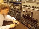 12/31/15 10pMT
Woody (w0ui) working the annual ARRL "Straight Key Night" event.
Here using the "brass-pounder" Morse code key that had belonged to his grandfather, Kenneth J Buck, Sr..
Ken was killed in action during World War 2 when his mine sweeper was torpedoed by a German submarine in the Bay of Salerno off the coast of Italy.
Rig:  Johnson Valiant transmitter, Collins 75a-4 receiver, GAP Voyager vertical