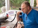 Mark Sullivan, KC1FYU, makes his first HF contact during Field Day 2017. (Photo: Kayla Creamer, W2IRY)