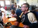 Alexis at the Mic with her Pap, logging contacts.
