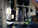 The right rear seat loaded with equipment.  Much of the electrical power distribution and filtering is behind the bottom row of power and amplifiers.