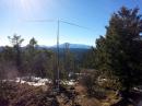 My homebrewed 6m dipole-hiking stick overlooks Pikes Peak in the background and seeks elusive Es.