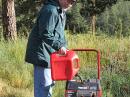 Allen, KØARK refueling the generator that operated flawlessly throughout Field Day.
