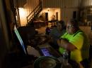 Paul Pellegrini, K1VK, demonstrates the FT8 station to Ken Olson, W7LSG.