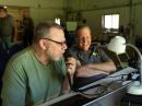 Mark Sullivan, KC1FYU, operates after some training from Field Day Chair Ken Caruso, WO1N.