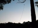 Look closely and you can see Venus twinkling at sunset under the feed point of the 20 meter dipole.  The center and end insulators were improvised from slices of flexible drain pipe.