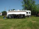 The hub of excitement: the trailer and awning of Doug and Anne, VE3ATP.
