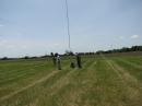 Working on the 80 meter vertical radials.