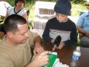 Father and son building a J-pole antenna.