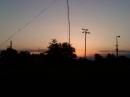 Max Gain telescoping mast and inverted G5RV at sunset