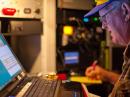 In the N6MI Contest Van, Bruce, WA6DNT is copying code on 20 meters.
