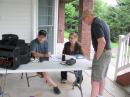Tom KCØWWQ with guests Brenda and Merle, prospective hams
