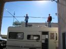 Mike and Mike, K2KR Putting up the Spider Beam on the back of the camper.