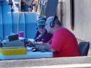 Visiting Boy Scoutmaster on phone.
