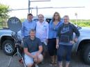 Five of the six Larsons at the Lakeville Water Tower EN34ip. Left to right in the rear: Mel KC0P/R, Nate KA0CRO, Denise KB0MRK & Liesl KD0VWT. Front row kneeling, Josiah
operating KE0DLQ. Photo by Carol N0HZO/R.