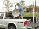 With Yagis secured for travel, Mel shows off the dish for 2304 MHz. Everbody says "Come on, its time to eat".