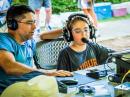 Joseph (10) on our GOTA station with his father Chris, KK4WNQ, as coach. (Photo: Dan Ewart, WG4F)