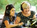 Trinity (10) operates the GOTA station with her newly licensed grandmother, JAY, KN4KXK. (Photo: Dan Ewart, WG4F)