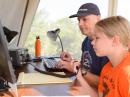 Gregory Cote, WY1X, and his daughter, Sarah, make some contacts during Sunday morning's Field Day activities.