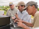 (from right to left) Bill Blackwell, AB1XB, Jim Wilber, AB1WQ, and Peter Nordberg, N1ZRG, make some contacts at NVARC's third station.