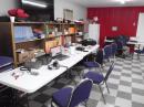 CW/Digital Station in Foreground with Exhausted Phone Operator in Background