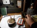 Tuna Tin 2 into a low pass filter in the altoids tin. Power via 'D' cell batteries. Key is a J-38.