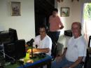 Gabriel LU3DAT operating. Raul LU6EF close and Gaston LW1EAA standing. Gaston is a novice class learning.
