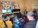 George McBride, N2VEH, of OMARC, guides some Tiger cubs as they speak to other Tiger cubs in England.  Photo Credit: George F Oliver, NC1A