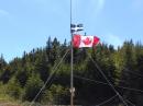 Black spruce multiband monopole.  The High Voltage sign was a bit extreme for a QRP operation but shows the dedication of our safety personnel. 