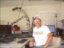 Bill W1WAB about ready to switch the TS-2000 over to  14.070 and PSK31 mode at start of Field Day 2010.

The IBM PC (Thinkcentre M52, left) is running Ham Radio Deluxe to control the rig (next to oscilloscope) .. While another IBM PC (right) controls the TS-700A/MFJ1278B running APRS on using the AGW Tracker program.

The monitoring VHF radios are off picture to right and under this camera. Note all the microphones and booms!