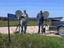 KC0P left and WB0LJC right set up on Jefferson Ridge EN43HN
201 km to Buck Hill and 99 km to WI, EN24SX. In the background we can see the horizon towards Buck Hill. With
binoculars we could see the grain elevators in Caledonia,
about eight miles.