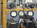 The meters, that are attached to the XMTR deck of the Old Oak Rig... swing with the pounding of brass.  Three of the meters, shown L to R are:   PA Plate, PA Grid, and Buffer Plate Current.
The equipment shown just below the meters is... the AM Plate Modulator Deck, which is not used for SKN or CW contacts.