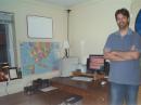 ARRL Contest Branch Manager Sean Kutzko, KX9X, at his Connecticut apartment QTH. The feedpoint for his indoor loop is at the top of the photo. Using QRP power and the indoor wire loop, he was still able to work 31 DXCC countries in the contest.