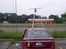 This is my setup from the park and ride parking lot off of the service road of Sunrise Highway in Patchogue.  The Two Meter beam is in an umbrella stand while the Six Meter beam is on a tripod on top of the car roof.