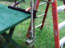 Trailer hitch umbrella mount in service as mast anchor.