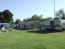 The site at Sunset Park with the tents, the LVRAC EmComm trailer and operators setting up antennas. 