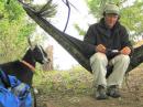 Rooster Goat listens for dupes while the Old Goat swings in the breeze on 20m CW from his 'ham-mock' shack.