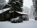 N7PR "CABIN" AT 5000 FEET DURING LIGHT SNOW STORM. OUR SIX HAM TOWERS AND SOLAR PANEL ARRAY ARE NOT SHOWN IN THIS PICTURE