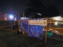 Lights from the nearby high school barely illuminate the NPARC banner
