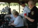 A member of a local served agency looks on as another contact is added to the logs.