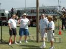 A park light support pole served as an impromptu antenna support structure. The Bedford Fire Department welcomes the chance to support the BARC Field Day efforts by assisting with hanging the dipole center point.